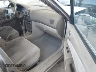2002 Toyota Corolla CE with VIN 1NXBR12E82Z624794, listed as a IAAI auction lot 42571532 with 122,749 mi miles and . Bid and sale history available at DreamBid. Image 5.