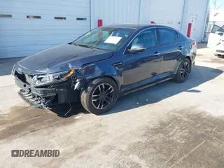 2015 Kia Optima LX with VIN 5XXGM4A77FG381505, listed as a IAAI auction lot 42105568 with 164,641 mi miles and . Bid and sale history available at DreamBid. Image 2.