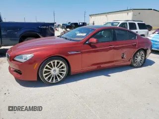 2015 BMW 6 Series 640i z VIN WBA6A0C57FD318727, wystawiony jako Copart lot #52132585 z przebiegiem 68 396 mil mil oraz Szkody całkowita. Historia ofert i sprzedaży dostępna na DreamBid. Obrazek 1.