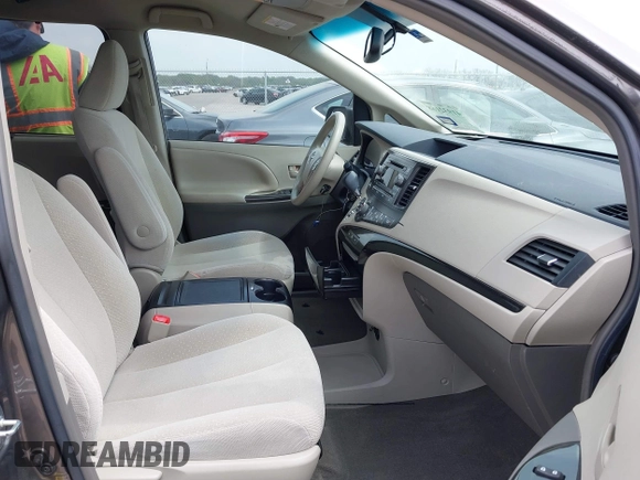 2013 Toyota Sienna LE AAS with VIN 5TDKK3DC1DS392577, listed as a IAAI auction lot 41932168 with 90,643 mi miles and . Bid and sale history available at DreamBid. Image 5.