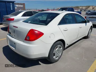 2008 Pontiac G6 1SV Value Leader z VIN 1G2ZF57B084285978, wystawiony jako IAAI lot #41726455 z przebiegiem 199 910 mil mil oraz . Historia ofert i sprzedaży dostępna na DreamBid. Obrazek 4.