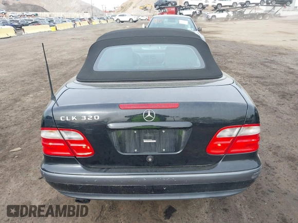 1999 Mercedes-Benz CLK with VIN WDBLK65G1XT013704, listed as a IAAI auction lot 42115880 with 85,741 mi miles. Bid and sale history available at carsss.com. Image 16.