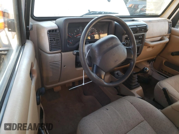 2002 Jeep Wrangler SE with VIN 1J4FA29P82P756330, listed as a Copart auction lot 83659574 with 156,901 mi miles and Salvage Title. Bid and sale history available at DreamBid. Image 8.