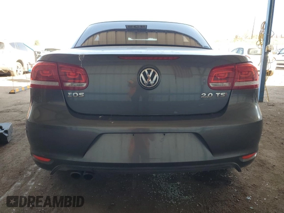 2014 Volkswagen Eos Komfort with VIN WVWBW8AH9EV006190, listed as a Copart auction lot 52390705 with 124,370 mi miles and Salvage Title. Bid and sale history available at DreamBid. Image 6.