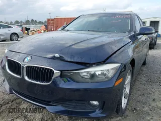 2015 BMW 3 Series 320i with VIN WBA3B1G53FNT07024, listed as a IAAI auction lot 41730253 with 66,684 mi miles. Bid and sale history available at carsss.com. Image 6.