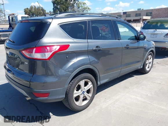 2015 Ford Escape SE with VIN 1FMCU0G78FUB96030, listed as a IAAI auction lot 41949876 with 172,940 mi miles. Bid and sale history available at carsss.com. Image 4.
