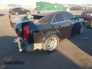 2009 Cadillac CTS RWD w/1SB with VIN 1G6DV57V190118771, listed as a IAAI auction lot 41296579 with 196,482 mi miles. Bid and sale history available at carsss.com. Image 4.