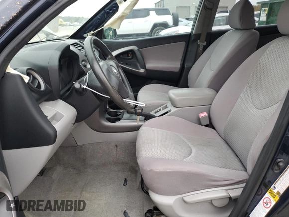2007 Toyota RAV4 with VIN JTMZK33V975011019, listed as a Copart auction lot 82492564 with 155,097 mi miles and Salvage Title. Bid and sale history available at DreamBid. Image 7.