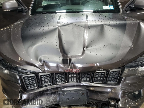 2018 Jeep Grand Cherokee Trailhawk with VIN 1C4RJFLG5JC504494, listed as a Copart auction lot 62953935 with 84,392 mi miles and Salvage title. Bid and sale history available at DreamBid. Image 12.
