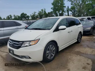 2015 Honda Odyssey Touring Elite with VIN 5FNRL5H98FB071942, listed as a Copart auction lot 57132464 with 148,015 mi miles and Salvage Title. Bid and sale history available at DreamBid. Image 1.