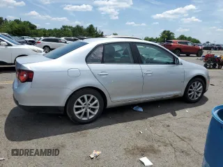 2010 Volkswagen Jetta Limited Edition with VIN 3VWRX7AJ6AM146644, listed as a Copart auction lot 84243994 with Not provided miles and Salvage title. Bid and sale history available at DreamBid. Image 3.