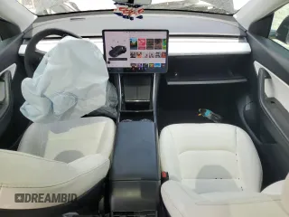 2021 Tesla Model Y Long Range z VIN 5YJYGDEE7MF081337, wystawiony jako Copart lot #55678295 z przebiegiem 58 809 mil mil oraz Szkody całkowita. Historia ofert i sprzedaży dostępna na DreamBid. Obrazek 8.