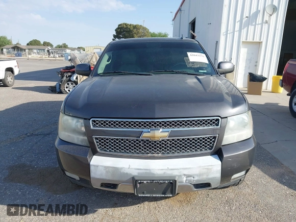 2011 Chevrolet Suburban LT with VIN 1GNSKJE34BR242629, listed as a IAAI auction lot 42043276 with 197,722 mi miles and . Bid and sale history available at DreamBid. Image 12.