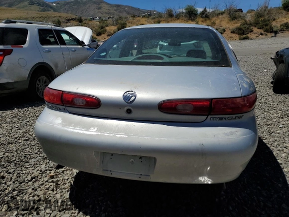 1996 Mercury Sable LS с VIN 1MELM53S4TG634577, выставлен на аукционе Copart как лот 61707733 с пробегом 76 781 миль миль и Списание • Salvage title. История ставок и продаж доступна на DreamBid. Изображение 6.