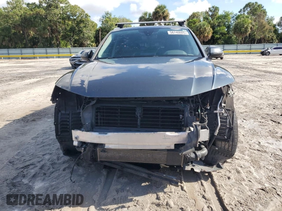 2018 Audi Q5 Premium Plus with VIN WA1BNAFYXJ2005610, listed as a Copart auction lot 58740605 with 138,328 mi miles and Salvage title. Bid and sale history available at DreamBid. Image 5.