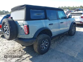 2023 Ford Bronco z VIN 1FMEE5DP7PLB81565, wystawiony jako IAAI lot #41891295 z przebiegiem 27 890 mil mil oraz . Historia ofert i sprzedaży dostępna na DreamBid. Obrazek 4.