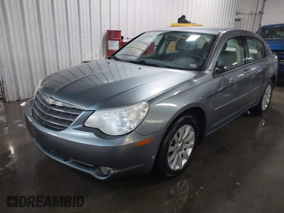 2010 Chrysler Sebring Limited z VIN 1C3CC5FD8AN134758, wystawiony jako IAAI lot #41190558 z przebiegiem 259 904 mil mil oraz . Historia ofert i sprzedaży dostępna na DreamBid. Obrazek 2.