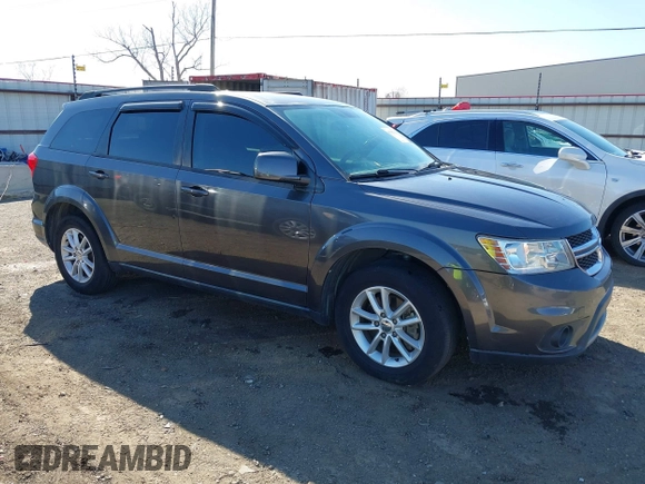 2014 Dodge Journey SXT with VIN 3C4PDCBG6ET192288, listed as a IAAI auction lot 41787594 with 132,973 mi miles. Bid and sale history available at carsss.com. Image 1.