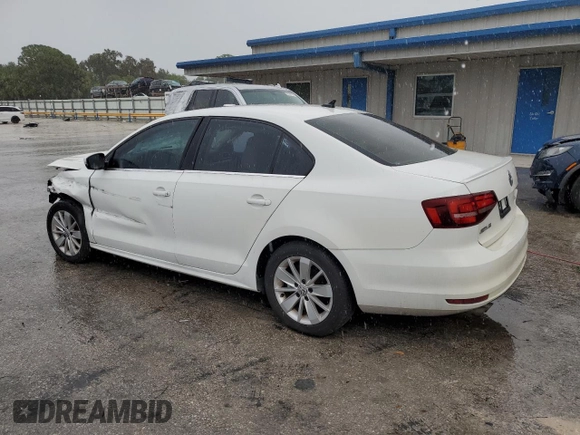 2016 Volkswagen Jetta Sedan 1.4T SE with VIN 3VWD67AJ7GM243423, listed as a Copart auction lot 85501724 with 90,743 mi miles and Salvage Title. Bid and sale history available at carsss.com. Image 2.