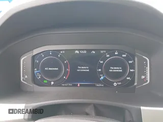 2023 Volkswagen Atlas SE z VIN 1V2KE2CA8PC225834, wystawiony jako IAAI lot #41330975 z przebiegiem 13 629 mil mil oraz . Historia ofert i sprzedaży dostępna na DreamBid. Obrazek 7.