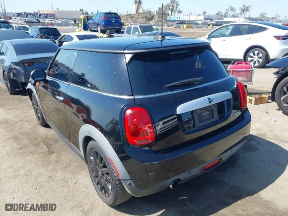 2015 MINI Cooper Hardtop with VIN WMWXM5C51FT941078, listed as a IAAI auction lot 41978808 with 62,682 mi miles. Bid and sale history available at carsss.com. Image 3.
