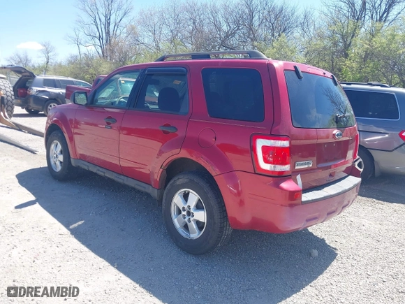 2010 Ford Escape XLT with VIN 1FMCU0D75AKB11394, listed as a IAAI auction lot 42037996 with 150,815 mi miles. Bid and sale history available at carsss.com. Image 3.