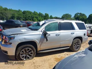 2020 Chevrolet Tahoe LT with VIN 1GNSKBKC5LR121085, listed as a IAAI auction lot 42341677 with 123,579 mi miles and . Bid and sale history available at DreamBid. Image 14.