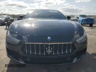 2019 Maserati Ghibli с VIN ZAM57XSA3K1311169, выставлен на аукционе Copart как лот 49583325 с пробегом 66 290 миль миль и Списание • Salvage title. История ставок и продаж доступна на DreamBid. Изображение 5.