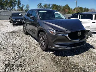 2018 Mazda CX-5 Grand Touring with VIN JM3KFADM2J1313418, listed as a Copart auction lot 49486875 with 94,930 mi miles and Salvage Title. Bid and sale history available at carsss.com. Image 14.