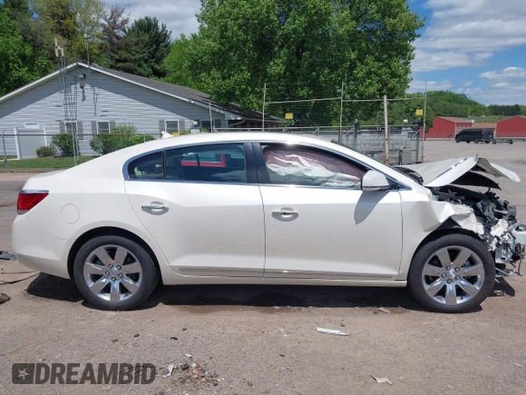 2012 Buick LaCrosse Premium 1 z VIN 1G4GD5E34CF130301, wystawiony jako IAAI lot #42205574 z przebiegiem 117 941 mil mil oraz . Historia ofert i sprzedaży dostępna na DreamBid. Obrazek 14.