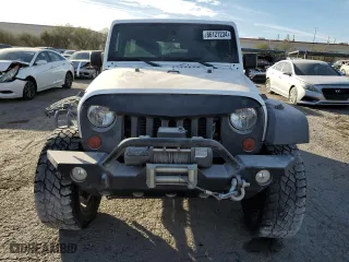 2012 Jeep Wrangler Unlimited Sport with VIN 1C4HJWDGXCL268227, listed as a Copart auction lot 86121234 with 137,585 mi miles and Salvage Title. Bid and sale history available at carsss.com. Image 5.