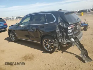 2020 BMW X5 xDrive40i with VIN 5UXCR6C08LLL83222, listed as a Copart auction lot 58377955 with 38,854 mi miles and Salvage title. Bid and sale history available at DreamBid. Image 2.