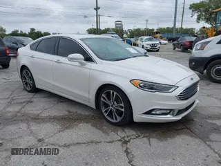 2017 Ford Fusion Titanium with VIN 3FA6P0K99HR272713, listed as a IAAI auction lot 41757334 with 104,733 mi miles. Bid and sale history available at carsss.com. Image 1.