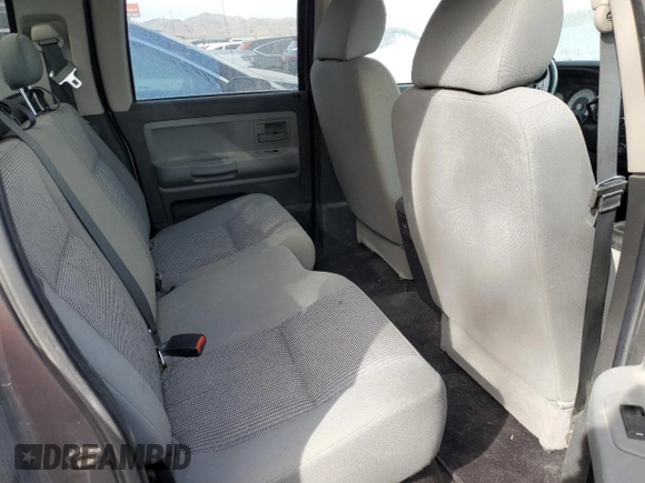 2008 Dodge Dakota Bighorn/Lonestar z VIN 1D7HE38K58S550926, wystawiony jako Copart lot #48440495 z przebiegiem Nie podano mil oraz Szkoda całkowita • Salvage title. Historia ofert i sprzedaży dostępna na DreamBid. Obrazek 10.