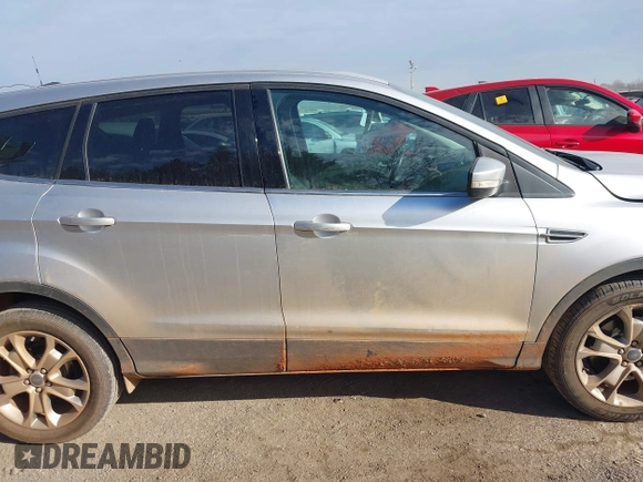 2013 Ford Escape SEL with VIN 1FMCU9H92DUD87086, listed as a IAAI auction lot 41614977 with 100,478 mi miles and . Bid and sale history available at DreamBid. Image 14.