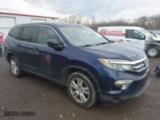 2016 Honda Pilot LX with VIN 5FNYF6H13GB061503, listed as a IAAI auction lot 42096651 with 226,785 mi miles. Bid and sale history available at carsss.com. Image 1.