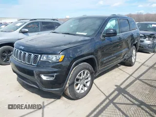 2021 Jeep Grand Cherokee Laredo X with VIN 1C4RJFAG7MC502866, listed as a IAAI auction lot 41841328 with 59,870 mi miles and . Bid and sale history available at DreamBid. Image 17.