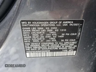 2021 Volkswagen Atlas SE z VIN 1V2LP2CA0MC586839, wystawiony jako Copart lot #88215305 z przebiegiem Nie podano mil oraz Szkody całkowita. Historia ofert i sprzedaży dostępna na DreamBid. Obrazek 12.