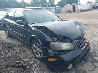 2001 Nissan Maxima SE with VIN JN1CA31A31T318300, listed as a IAAI auction lot 42178819 with 246,947 mi miles and . Bid and sale history available at DreamBid. Image 1.