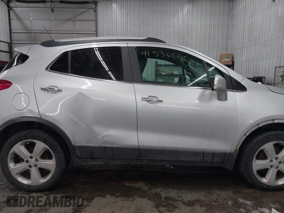 2015 Buick Encore Convenience with VIN KL4CJFSB5FB229552, listed as a IAAI auction lot 41536656 with 55,101 mi miles. Bid and sale history available at carsss.com. Image 13.