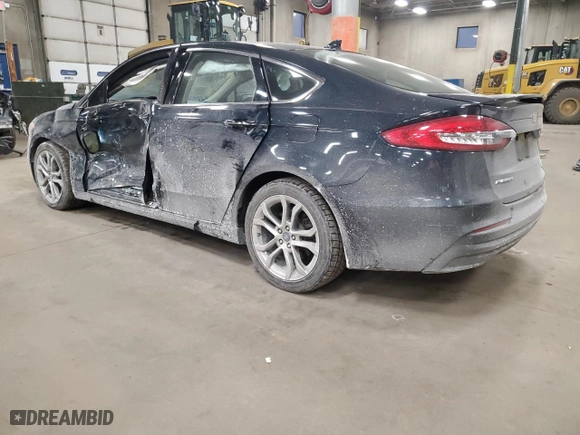 2020 Ford Fusion Hybrid Titanium with VIN 3FA6P0RU3LR233957, listed as a Copart auction lot 84908134 with 71,666 mi miles and Salvage Title. Bid and sale history available at carsss.com. Image 2.