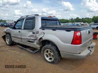 2005 Ford Explorer Sport Trac XLS with VIN 1FMZU67K95UA94980, listed as a Copart auction lot 63490315 with 126,737 mi miles and Salvage title. Bid and sale history available at DreamBid. Image 2.
