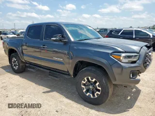2023 Toyota Tacoma SR z VIN 3TMCZ5AN5PM598443, wystawiony jako Copart lot #60485035 z przebiegiem 18 842 mil mil oraz Szkoda całkowita • Salvage title. Historia ofert i sprzedaży dostępna na DreamBid. Obrazek 4.