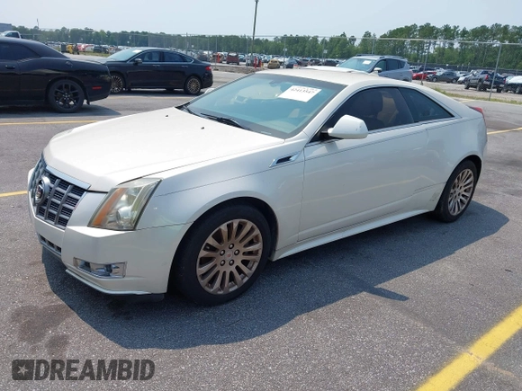 2012 Cadillac CTS Premium z VIN 1G6DP1E3XC0108543, wystawiony jako IAAI lot #42413547 z przebiegiem 80 570 mil mil oraz . Historia ofert i sprzedaży dostępna na DreamBid. Obrazek 2.