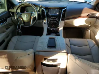 2015 Cadillac Escalade z VIN 1GYS4AKJ1FR100437, wystawiony jako Copart lot #78578004 z przebiegiem 51 574 mil mil oraz Czysty tytuł • Clean title. Historia ofert i sprzedaży dostępna na DreamBid. Obrazek 8.