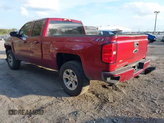 2019 Chevrolet Silverado 1500 LT with VIN 2GCVKPEC2K1180858, listed as a IAAI auction lot 41513814 with 103,765 mi miles and . Bid and sale history available at DreamBid. Image 3.