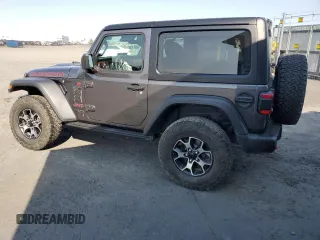 2023 Jeep Wrangler Rubicon with VIN 1C4HJXCG5PW652704, listed as a Copart auction lot 59762475 with 19,924 mi miles and Salvage title. Bid and sale history available at DreamBid. Image 2.