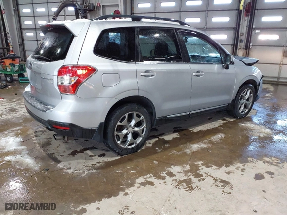 2015 Subaru Forester 2.5i Touring with VIN JF2SJAUCXFH471892, listed as a IAAI auction lot 41314722 with 94,717 mi miles. Bid and sale history available at carsss.com. Image 4.