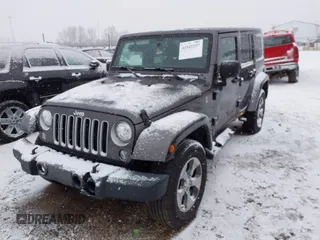 2017 Jeep Wrangler Unlimited Sahara with VIN 1C4BJWEG4HL591149, listed as a IAAI auction lot 41542157 with 70,630 mi miles. Bid and sale history available at carsss.com. Image 2.