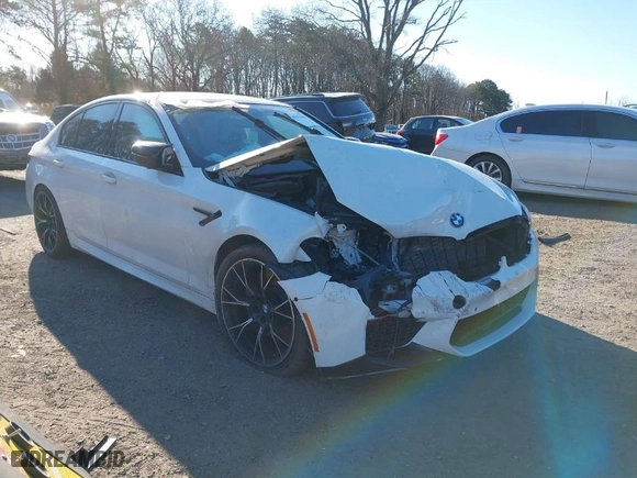 2019 BMW M5 Competition with VIN WBSJF0C57KB285614, listed as a IAAI auction lot 39011419 with 1 mi miles. Bid and sale history available at carsss.com. Image 1.